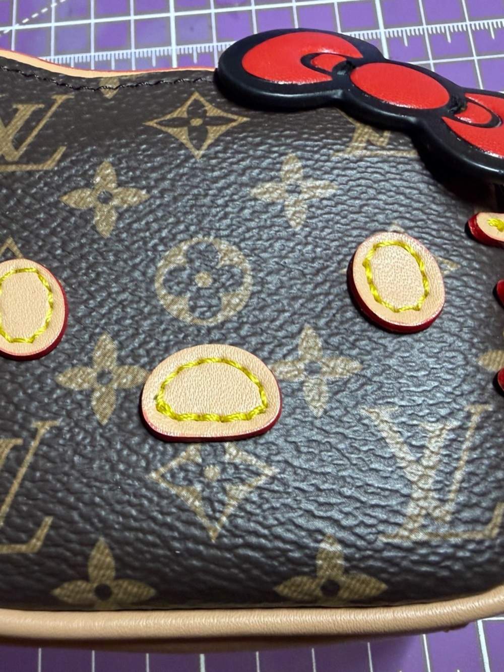 Louis Vuitton Brown Monogram Wristlet with Red Trim